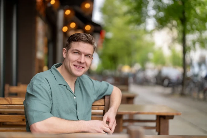 Man sitting at outdoor café.