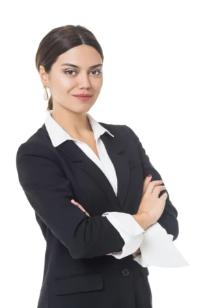 Confident woman in a black blazer and white blouse, arms crossed on white background, professional headshot with studio light